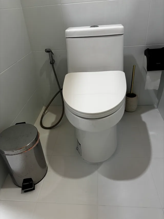 Clean modern bathroom with white fixtures